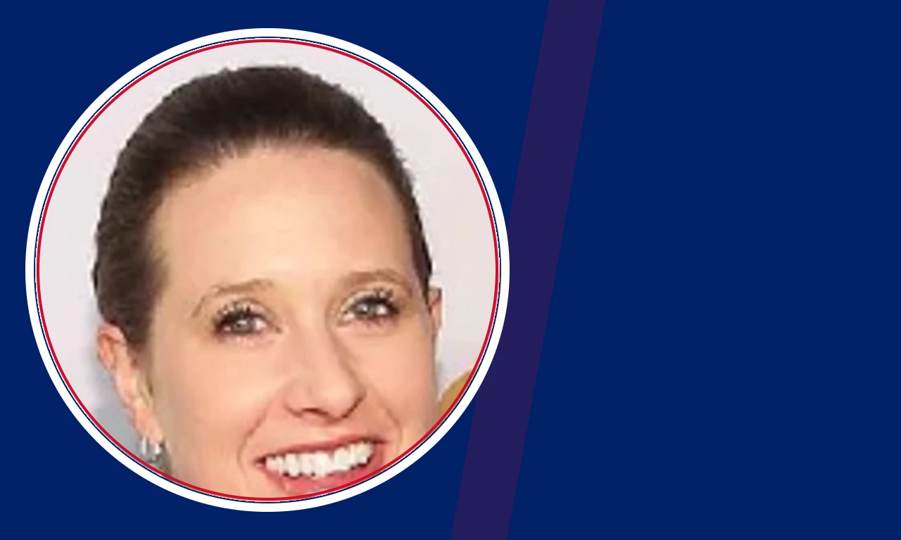 Caroline Nantz portrait on navy background