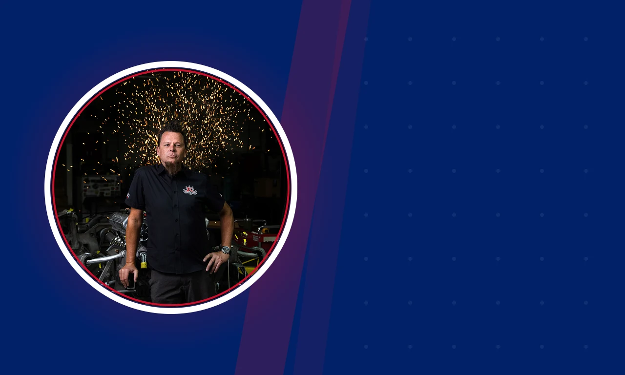 Dave Kindig circular portrait photo on navy background