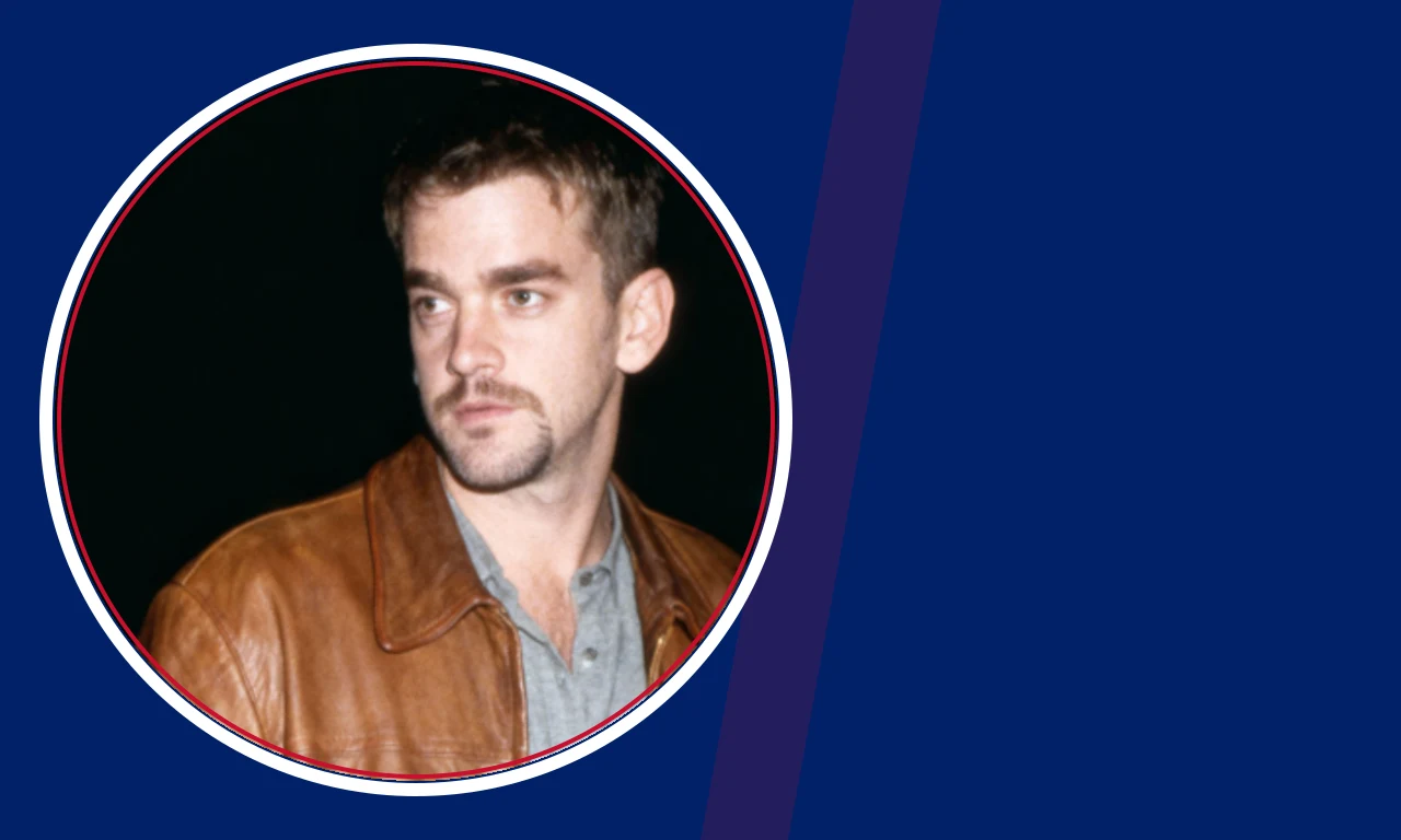 Will Theron Roth portrait on navy background