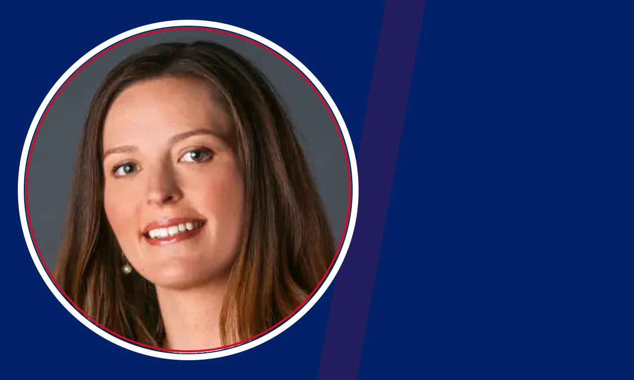 Erin Barry portrait on navy background