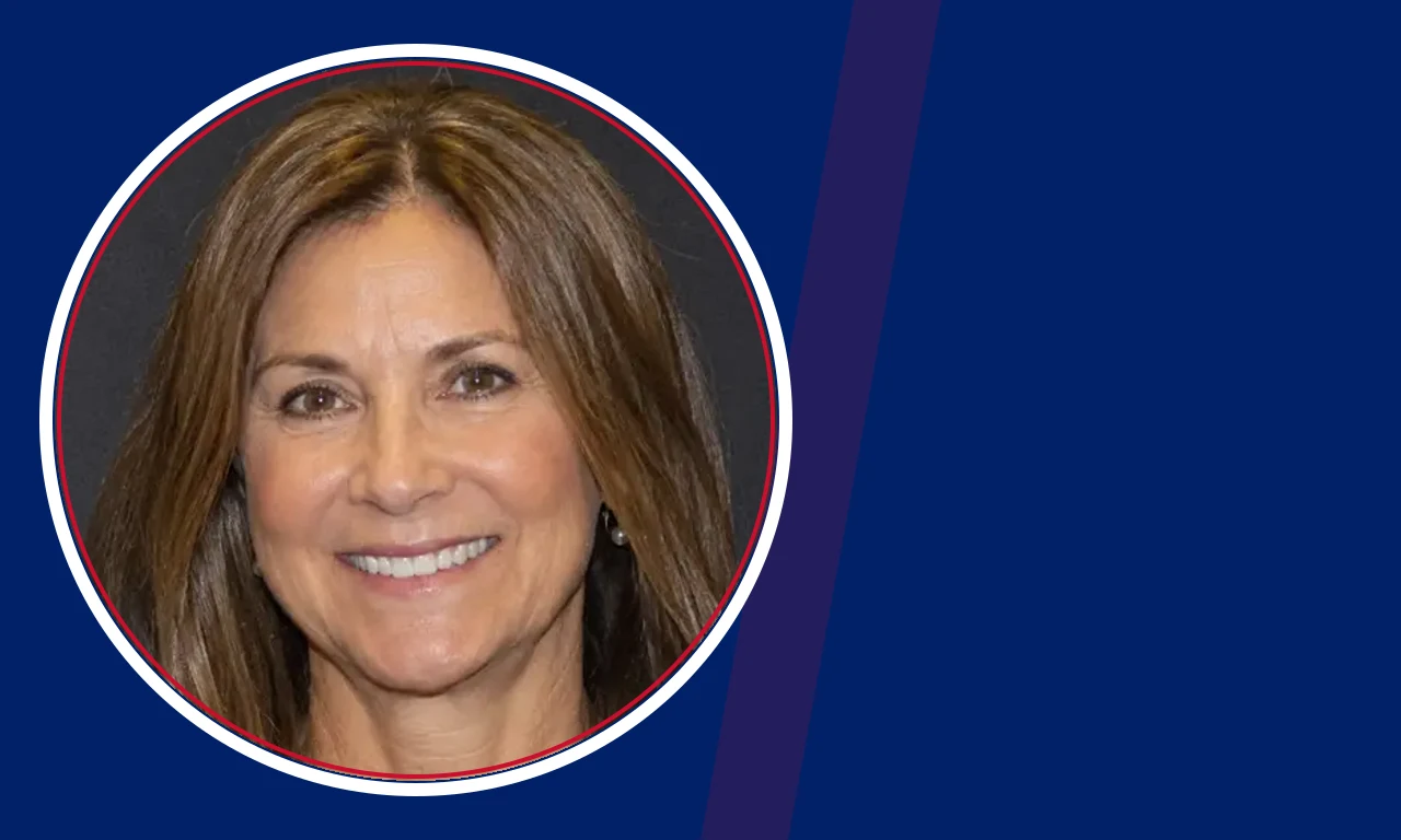 Gina Capitani portrait on navy background