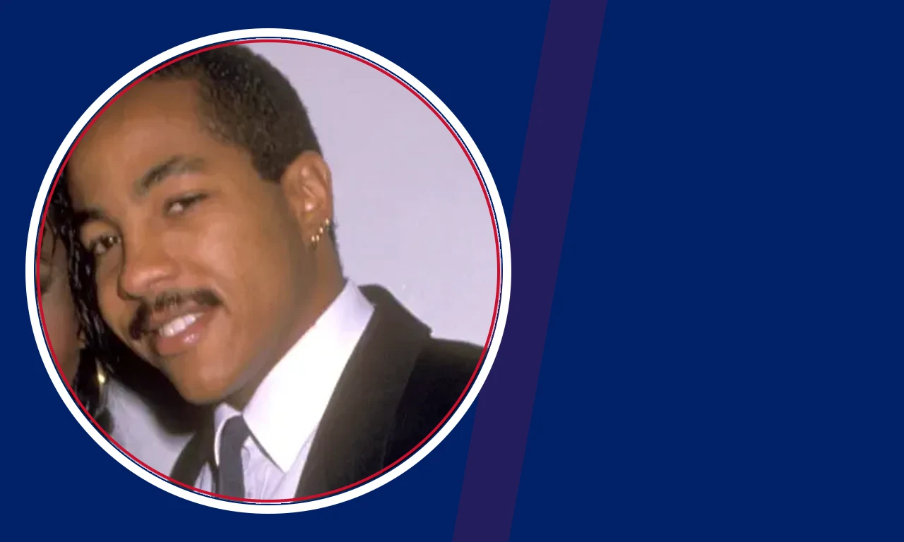 James Newman III portrait on navy background