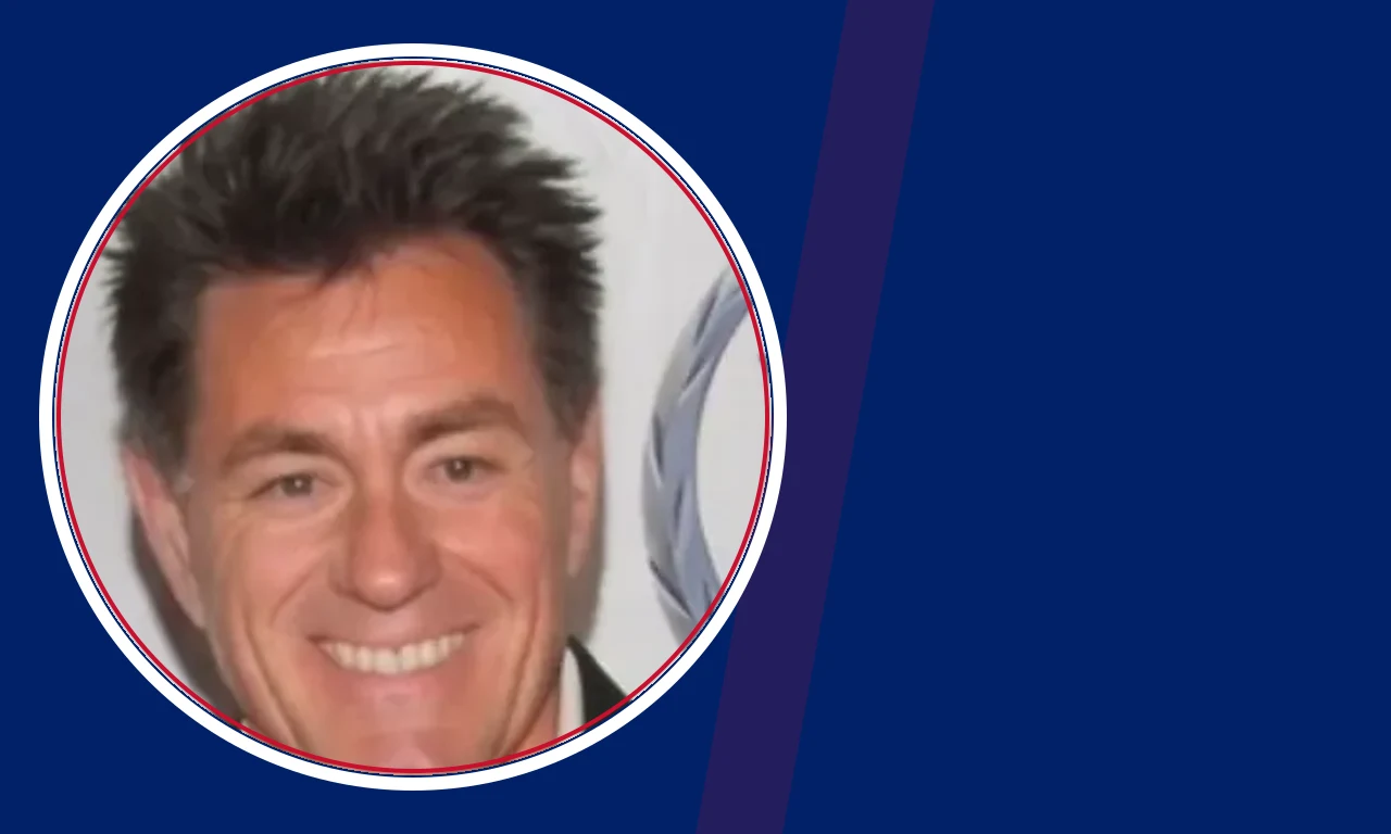 Richie Palmer portrait on navy background