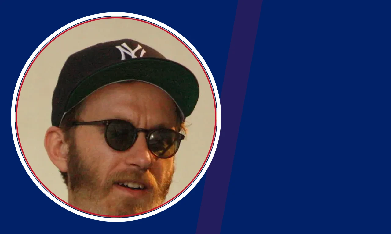Tay Strathairn portrait on navy background